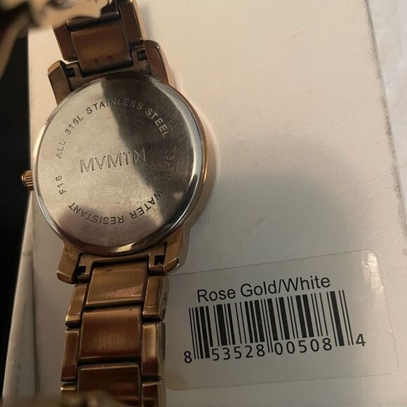 MVMT rose gold watch. Great condition. With extra links and box. - Picture 3 of 4